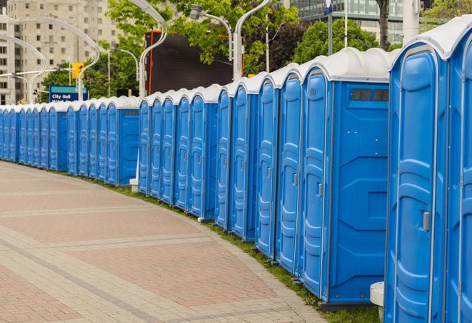 a row of portable restrooms at a trade show, catering to visitors with a professional and comfortable experience in Catoosa